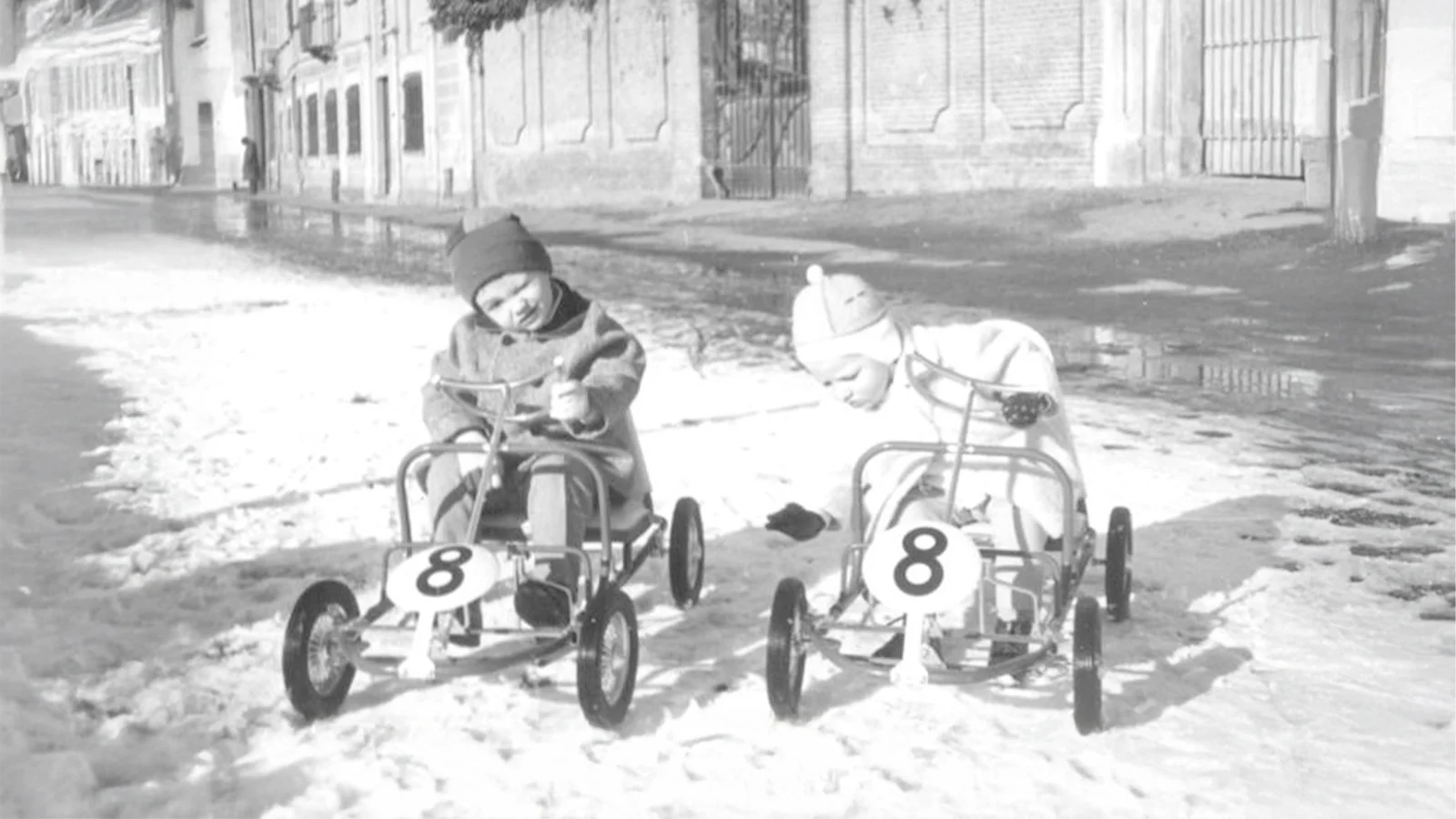 1959 Paolo Garella driving a pedal car