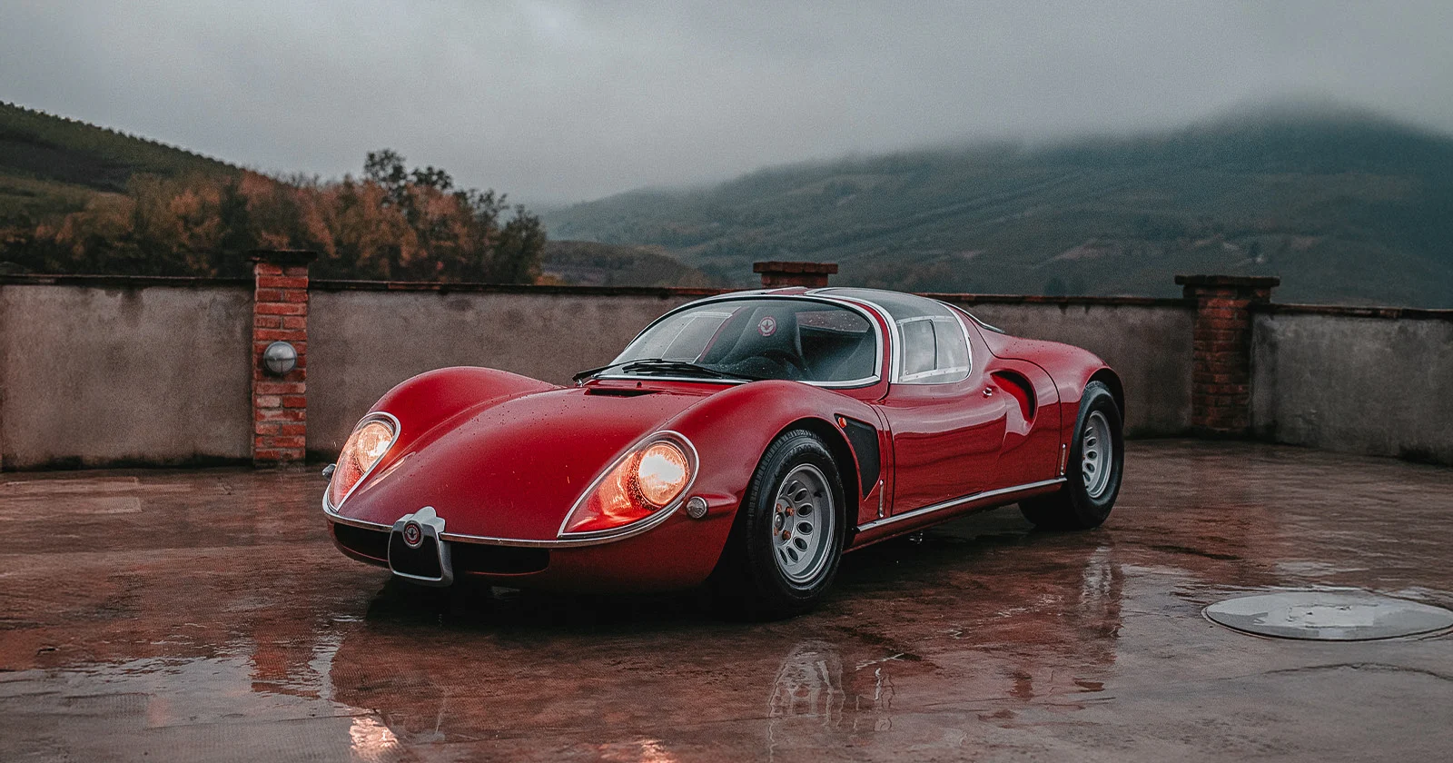 Jewelry | Manifattura Automobili Torino – On Rain-Slicked Terrace with Hills