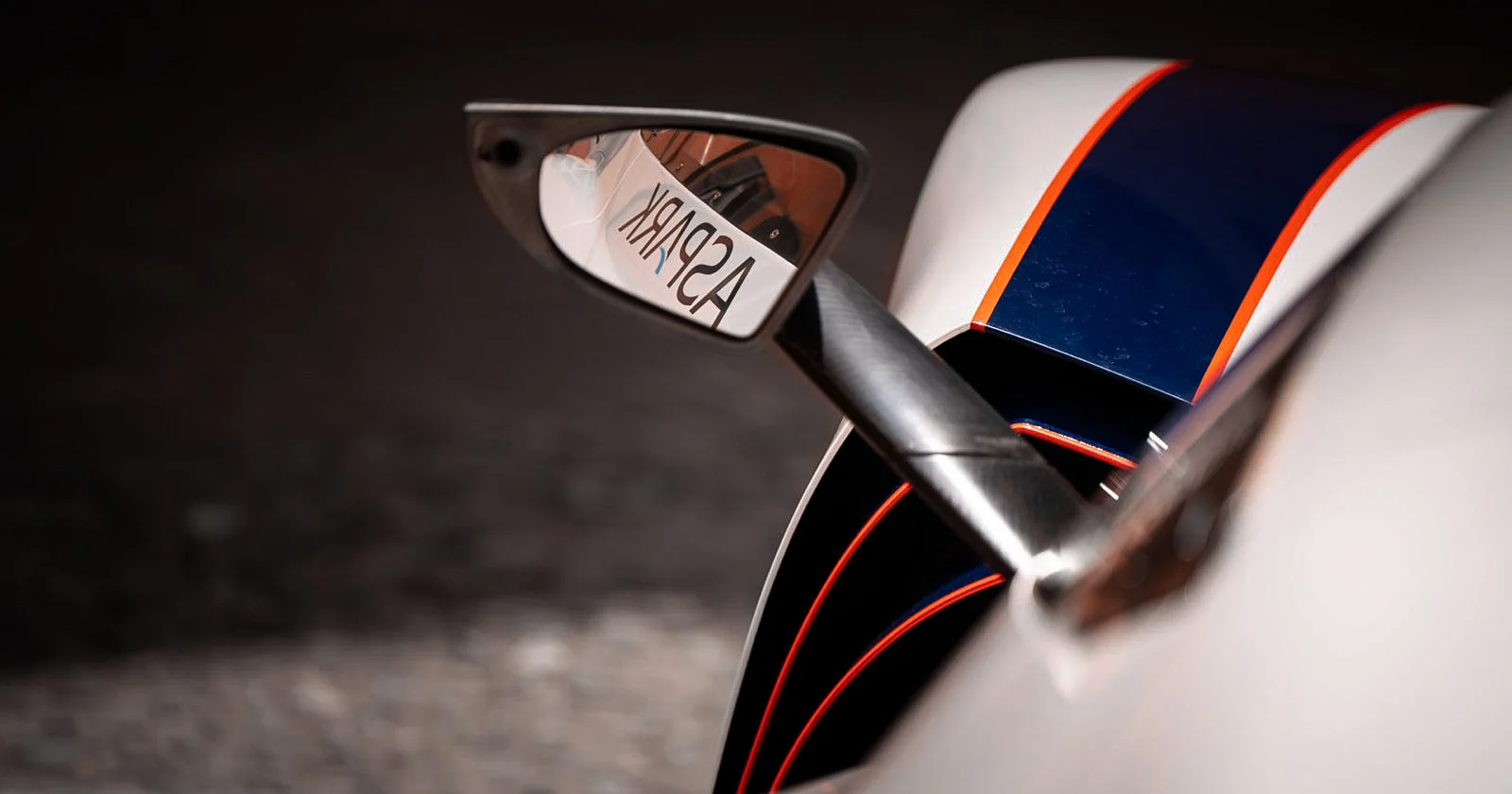 Aspark SP600 – window detail with reflected Aspark logo