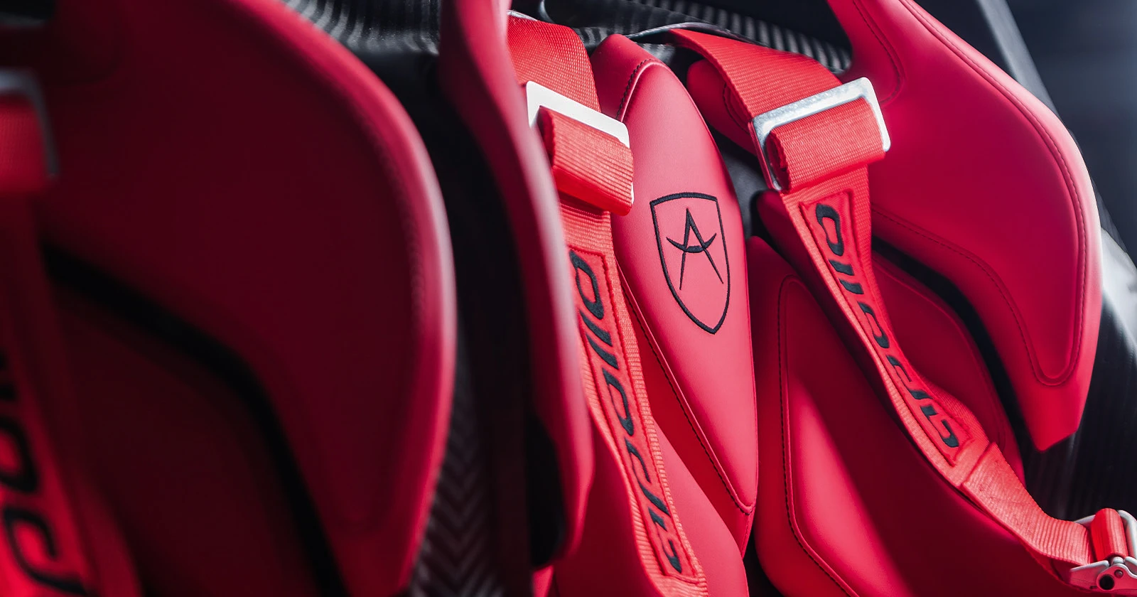 Apollo IE – red leather driver seat detail