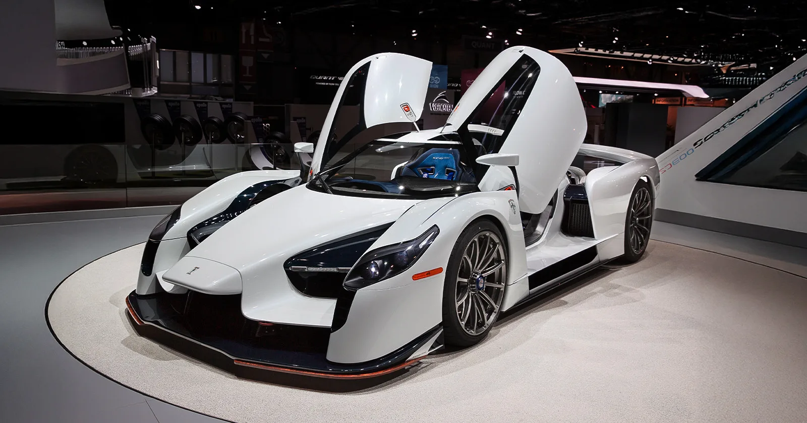 SCG003S – Displayed with Open Butterfly Doors at an Auto Show | Manifattura Automobili Torino