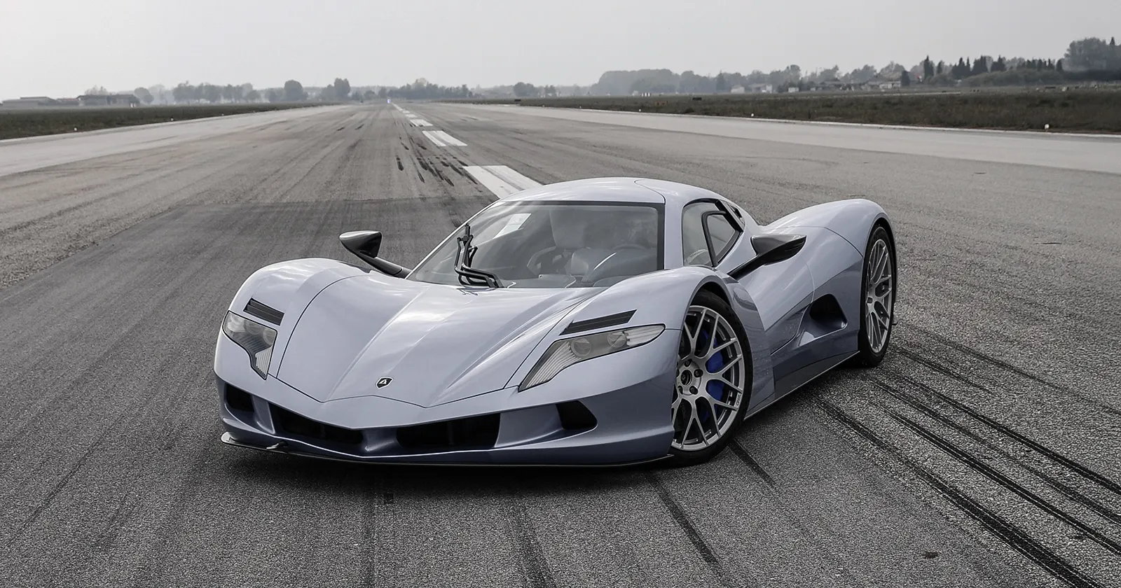 Aspark Owl – three-quarter view on track